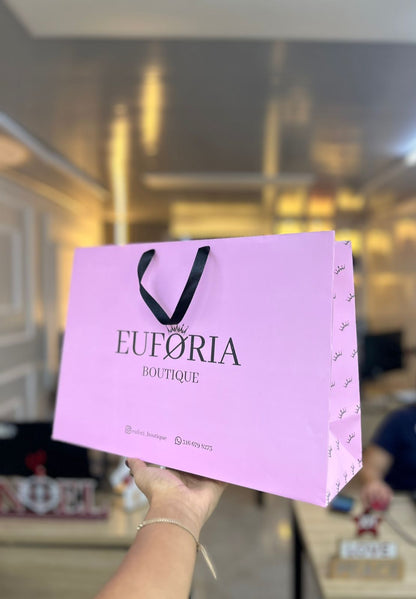 Bolsa premium rosada con cinta y logo en fucsia